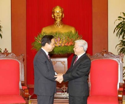 Líderes partidistas de China y Vietnam abogan por fomentar cooperación integral